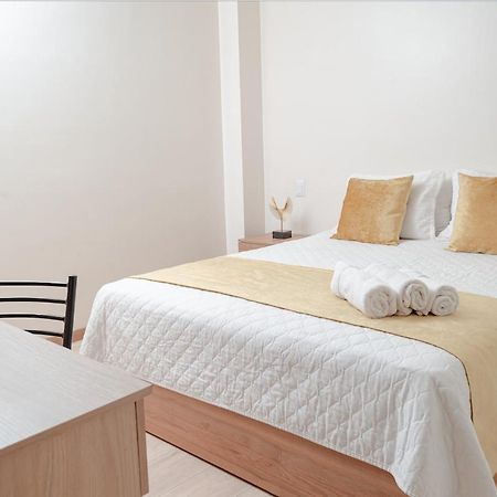 Hotel Bristool Parc - Departments & Suites กูเอ็งกา ภายนอก รูปภาพ