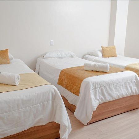 Hotel Bristool Parc - Departments & Suites กูเอ็งกา ภายนอก รูปภาพ