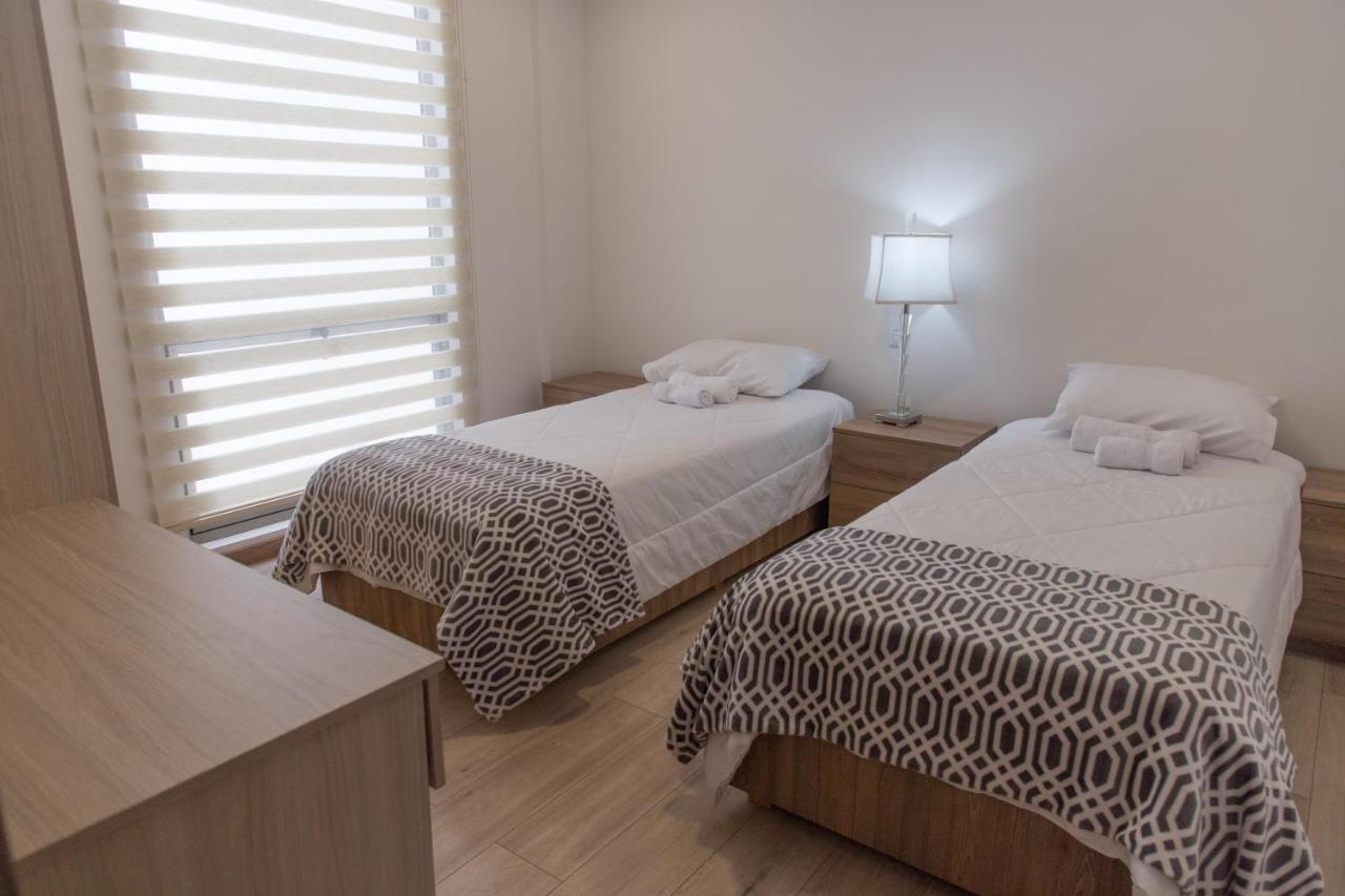 Hotel Bristool Parc - Departments & Suites กูเอ็งกา ภายนอก รูปภาพ