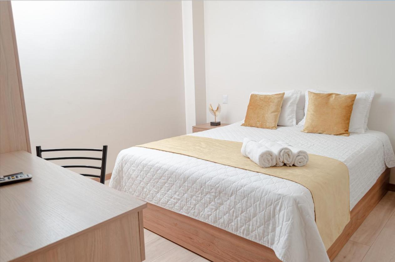 Hotel Bristool Parc - Departments & Suites กูเอ็งกา ภายนอก รูปภาพ